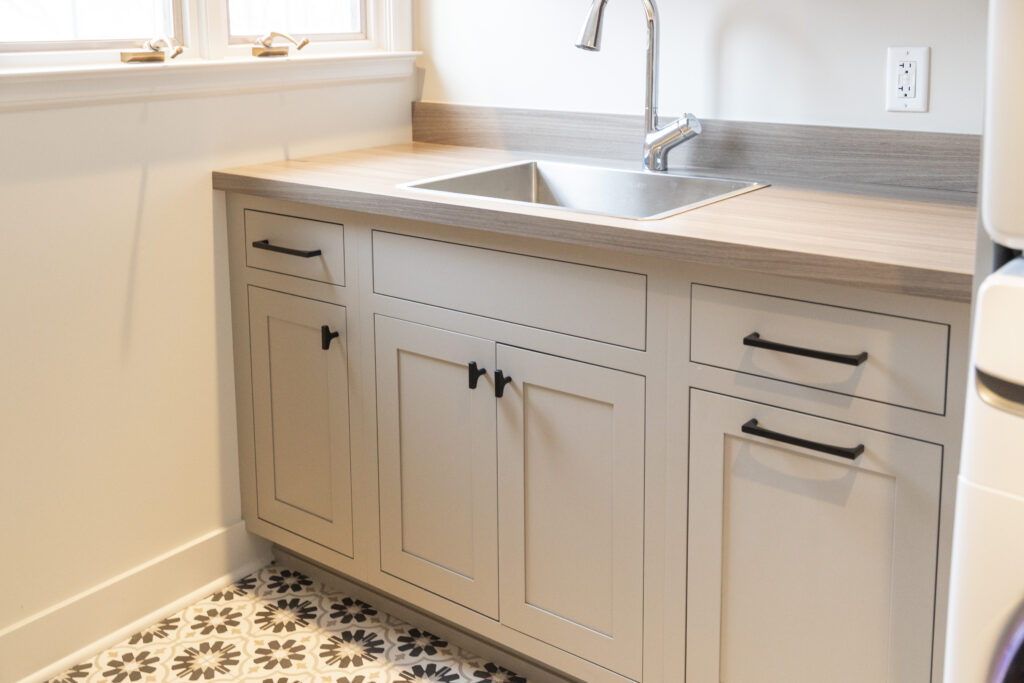Detail of new sink vanity in residential bathroom renovation