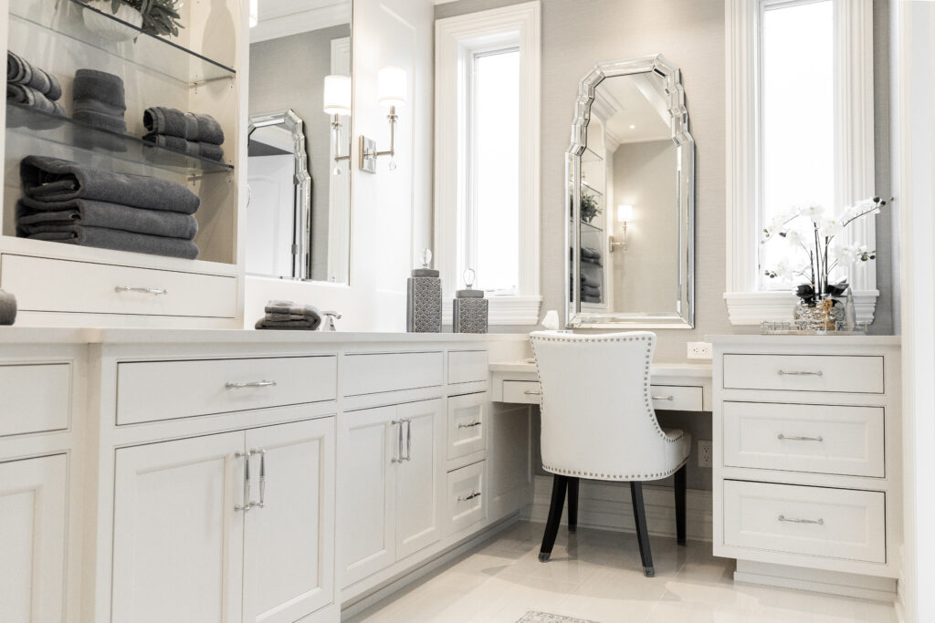 A beautifully renovated bathroom showcasing a custom-made vanity setup.
